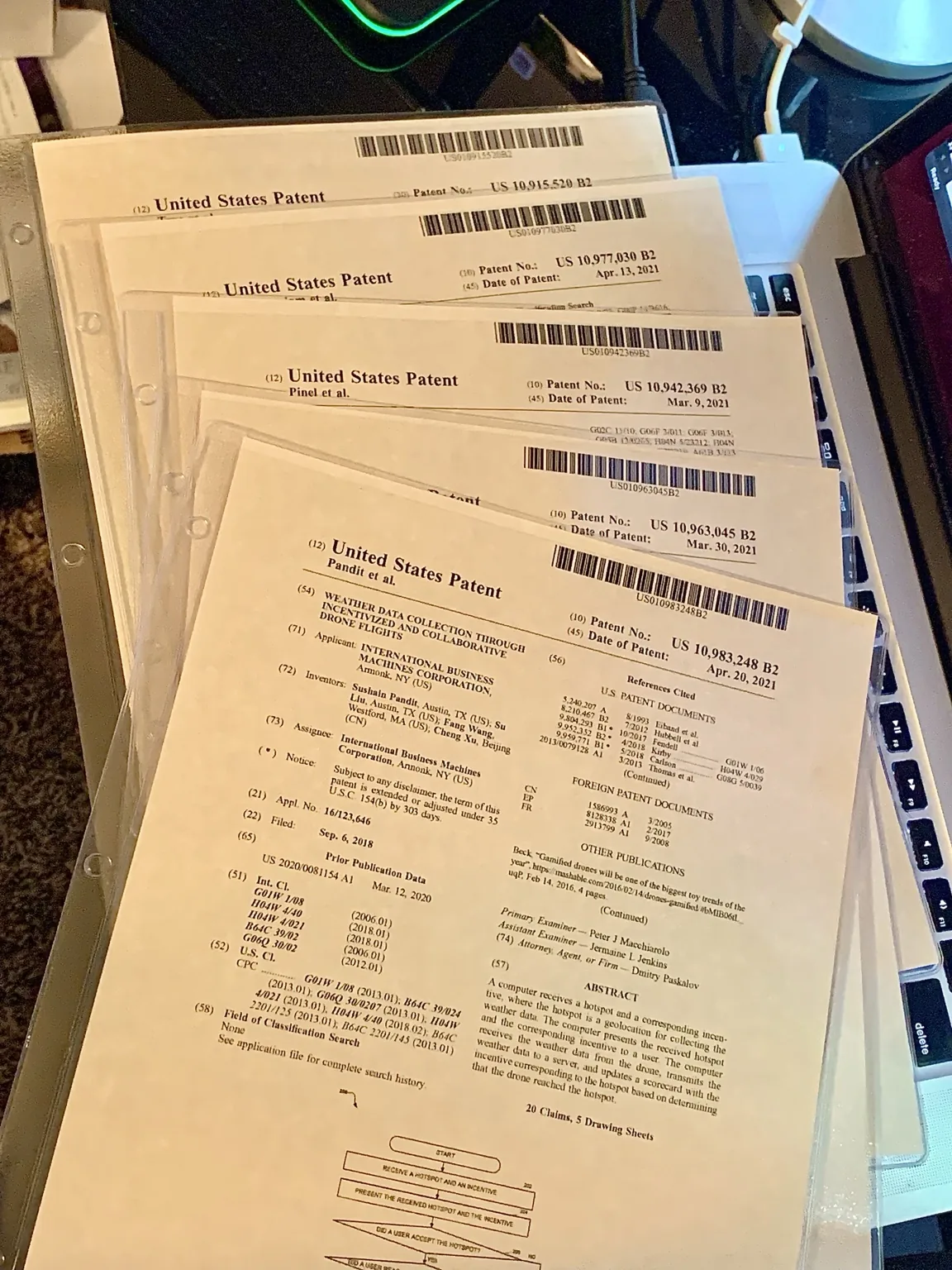 A stack of issued United States patents